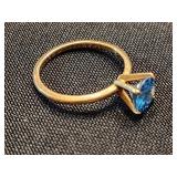 14 K gold ring with  solitary blue Zirconium