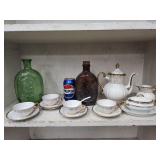 Porcelain tea pot, creamer, cups unknown maker