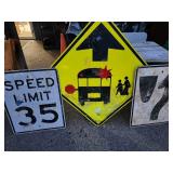 3 traffic signs.  Look at the photos for more