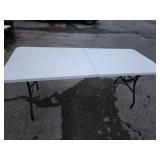 Folding table 6ft length.   Folds in half .  Pick