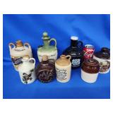 Stoneware,  ceramic and glass advertising jugs.