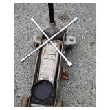 Hydraulic jack and lug wrench.  Pick up only.