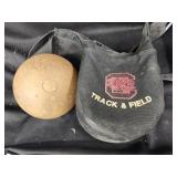 Polinik shot put with track and field bag.  Look
