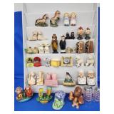 24 pairs of Novelty Salt and Pepper shakers.