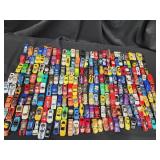 225 Hot Wheel and other cars and trucks.  Play