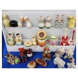 16 Novelty salt and pepper shakers.   Bar k