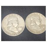 2 Silver Benjamin Franklin Half Dollar coins.