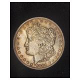 1904 Morgan Silver dollar coin.  Look at the
