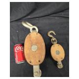 2 Antique Block Pulleys large one has an anvil on