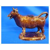Rockingham / Bennington cow creamer.   5.5" H.