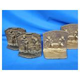 2 pairs of cast metal bookends.  The
