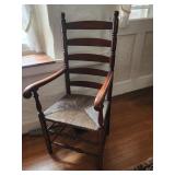 Ladder back armchair circa 1950 rush seat.  Look