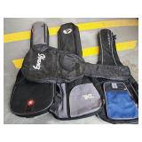 4 soft guitar cases.