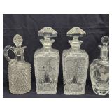 4 Decanters - 2 Cut Crystal with stoppers heavy