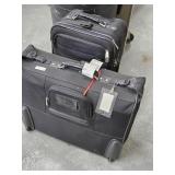 2 Suitcases look at pictures for more detailed