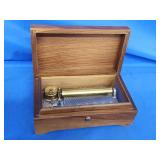 Reuge Swiss made music box walnut dovetail box.