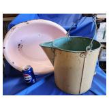 Large painted galvanized watering cand and pink