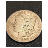 1883 Morgan Silver Dollar coin.    Look at the