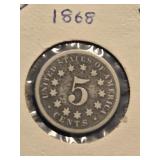 1868 5 cent Shield nickel.  Look at the photos