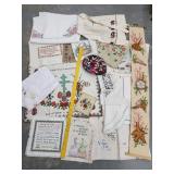 Hand embroidery samplers, tea towls, hat, apron,