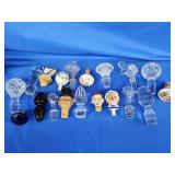 19 decanter/ Liquor stoppers including 2 novelty