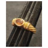 14K gold ring with oval citrine stone.  Twist