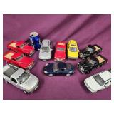 10 Maisto car and Truck models. Nine are 1/25