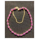 14K gold tennis bracelet with ruby stones and