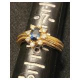 14K gold ring with oval sapphire with 8 smal