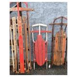 3 Vintage Sleds one has original advertising on