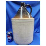 Stoneware 5 gal. jug 17" H.  Look at the photos
