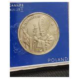 Pope John Paul medal.   Look at the photos for