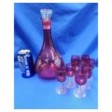 Ruby glass decanter with 8 glass cordials.