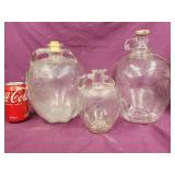 3 vintage Apple Cider apple jugs.  Embossed apple