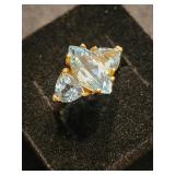 14 K gold ring with 3 Topaz stones.  Estate