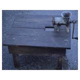 Primitive meat grinder on stand look at pictures