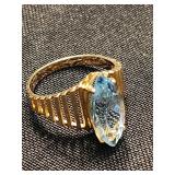 10 K gold ring with Blue Topaz stones marquis