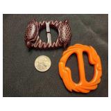 2 vintage bakelite slide belt buckles.  Carved