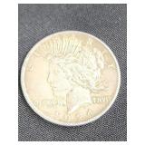 1924 Peace silver dollar coin.  Look at the
