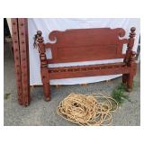 Rope bed with original red paint.  Has rails and