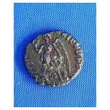 Ancient Bronze Roman coin.  Right face Emperer