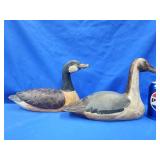 2 mass produced wood decorative ducks.   8' H and
