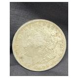 1921 Morgan Silver dollar coin.     Look at the