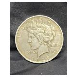 1923 Morgan Silver dollar coin.    Look at the