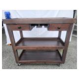 Wood bar cart on casters.  32" h x 34" l x 16" D.