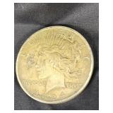1924 Silver Peace Dollar coin.   Look at the