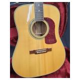 George Washburn acoustic guitar with hard case.