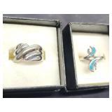 2 Sterling silver rings.  Wave swirl band and