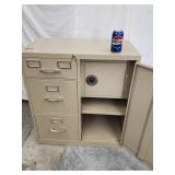 Metal file cabinet with built-in safe.  Has keys