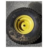 Lawn tractor tire.   Has cracks.  PICK UP ONLY.